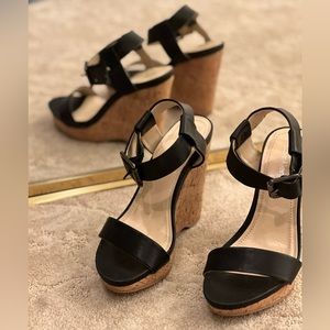 Calvin Klein black Nikole wedge platform sandal.
